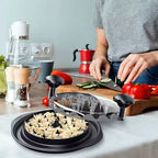 Manual chicken shredder in use on a kitchen counter