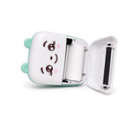 Mini pocket printer with lid open showing the thermal paper roll