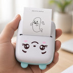 Pocket-size mini thermal printer held in hand