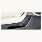 Folded sunshade stored in car door pocket