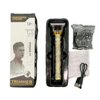 Vintage T9 trimmer box contents with USB cable and cleaning brush